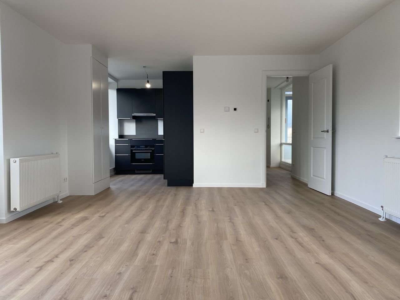 Bright top-floor apartment with a full-length balcony - Image 2