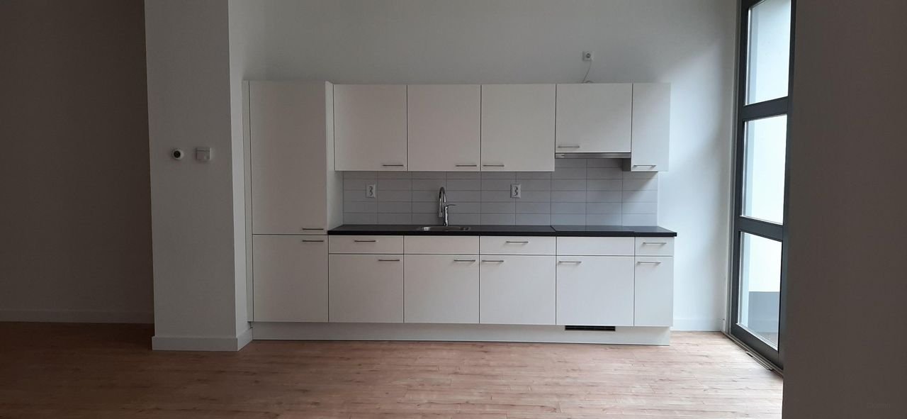 Benedenwoning van 92 m² met tuin - Afbeelding 2