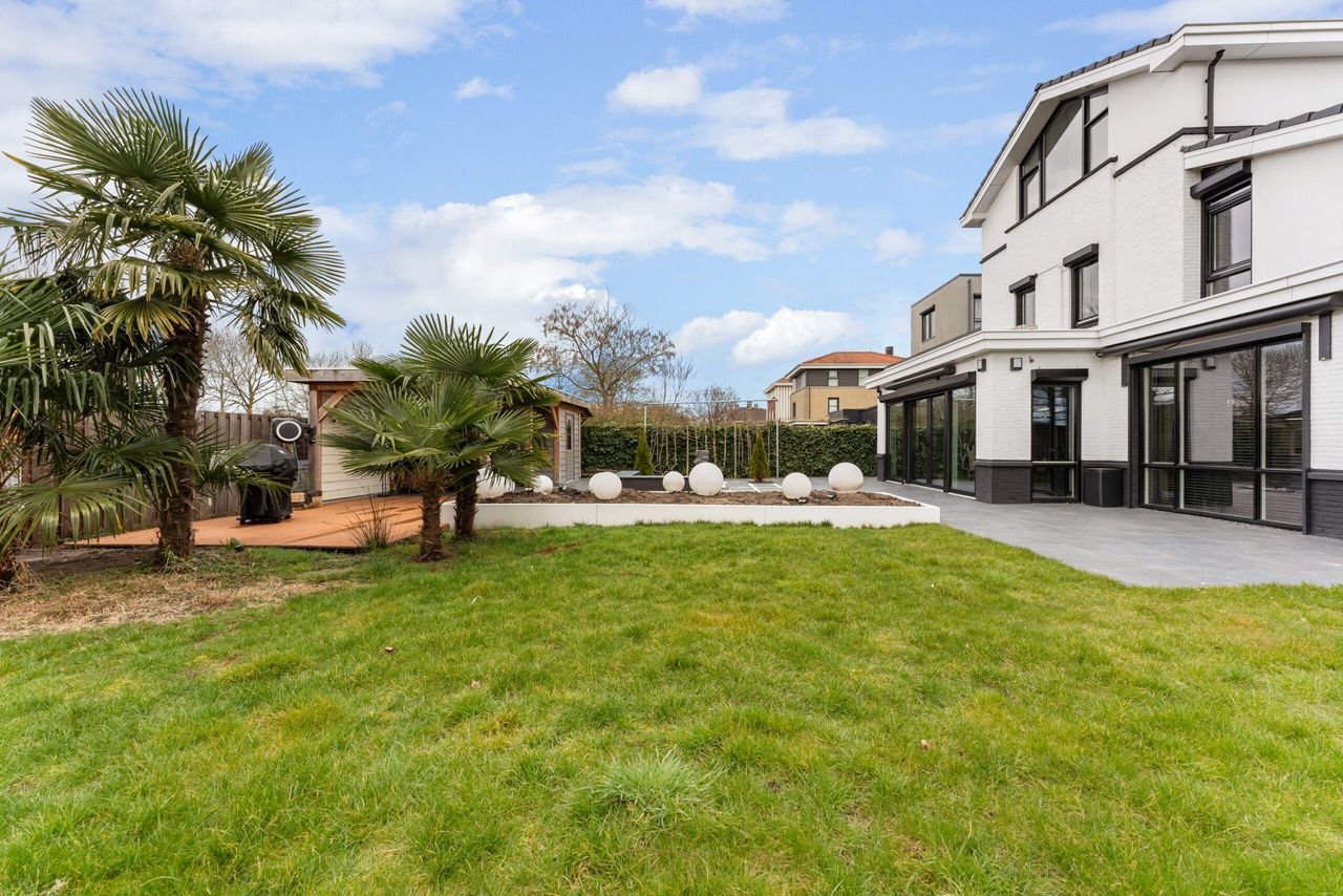 Vrijstaande villa met sauna in groen Dubbeldam - Afbeelding 2