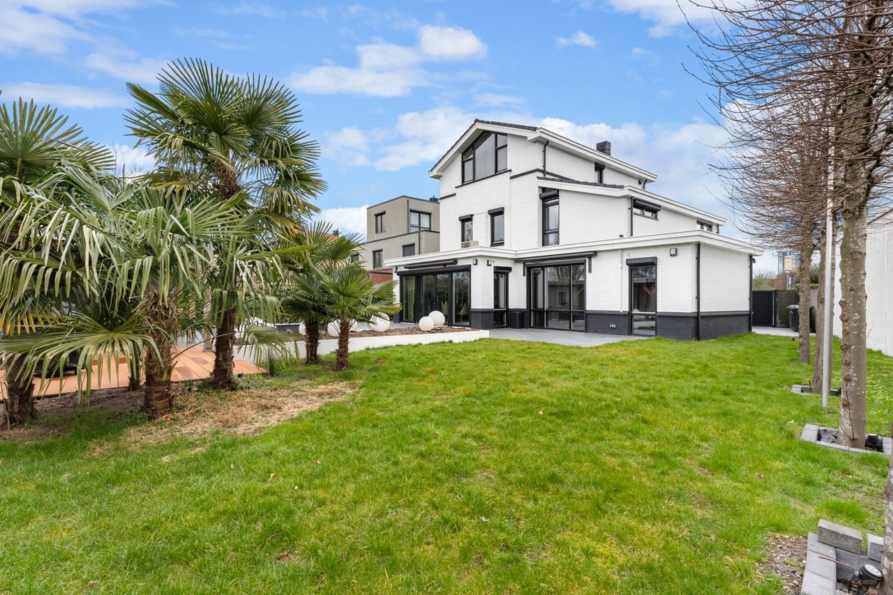 Vrijstaande villa met sauna in groen Dubbeldam - Afbeelding 1