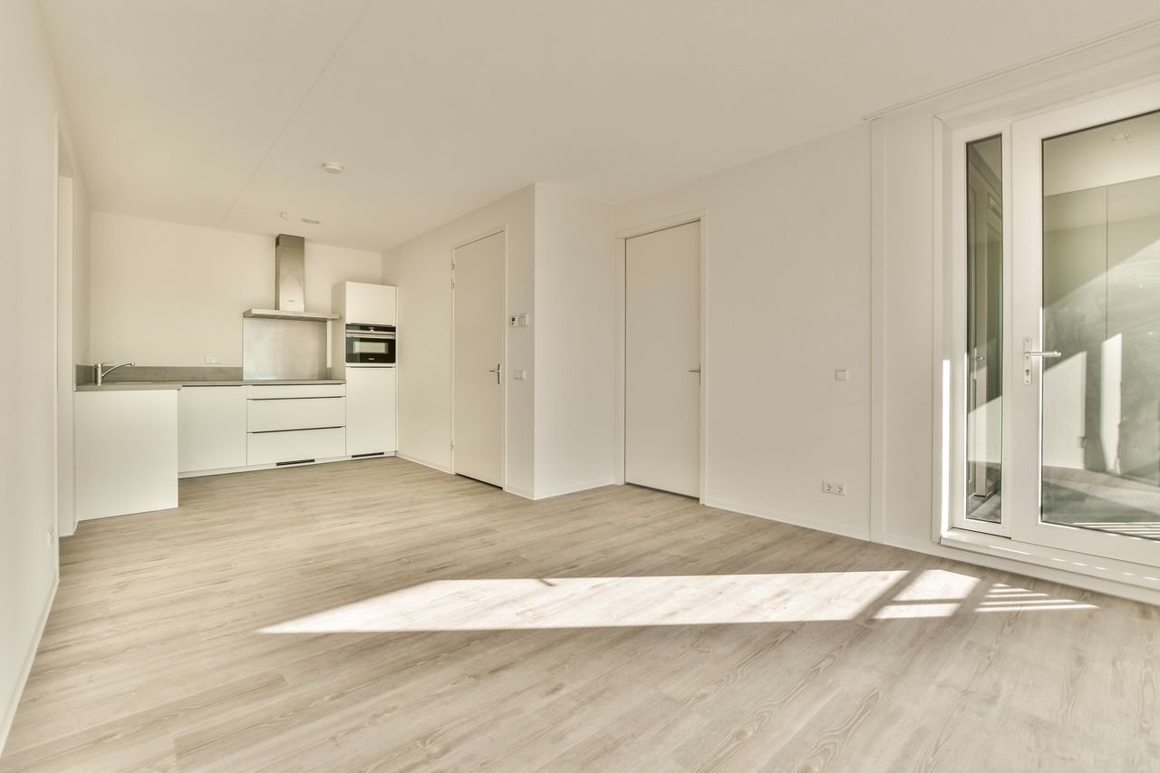 Licht hoekappartement op Osdorpplein - Afbeelding 1