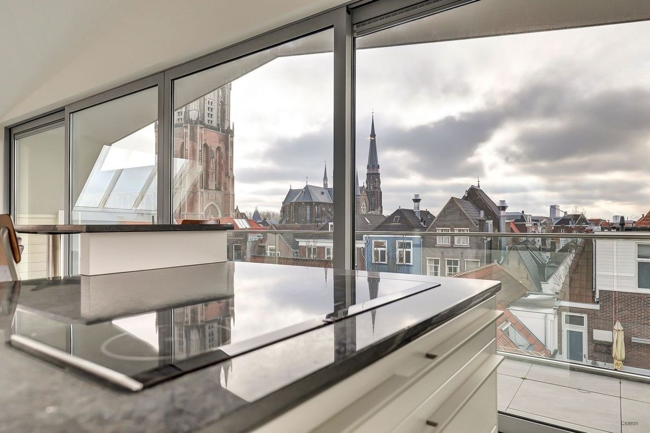 Modern penthouse with roof terrace in the heart of Delft - Image 30