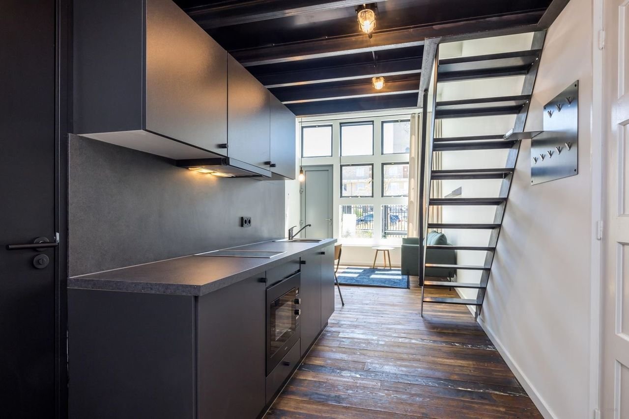 Industrieel wonen in oud schoolgebouw - Afbeelding 4