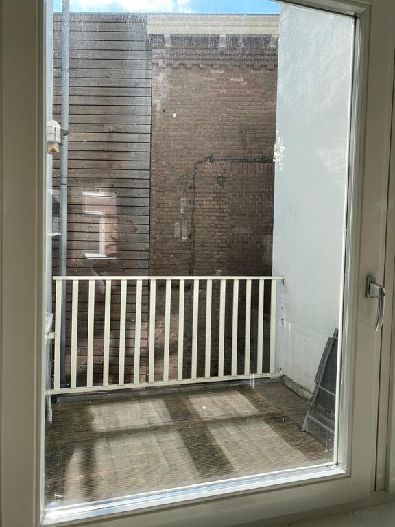 Furnished 1-Bedroom Apartment with Terrace - Image 4