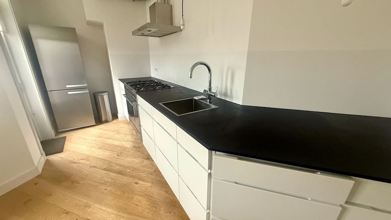 Licht hoekappartement met open haard - Afbeelding 10