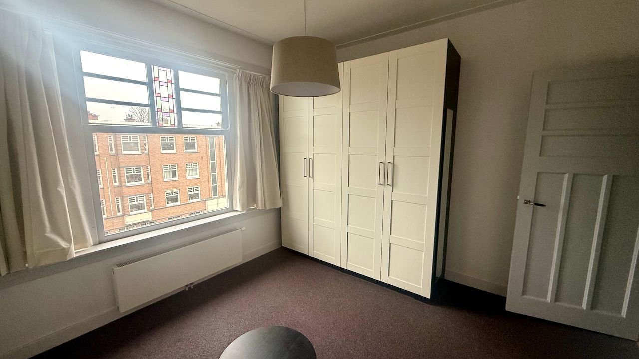 Licht hoekappartement met open haard - Afbeelding 16