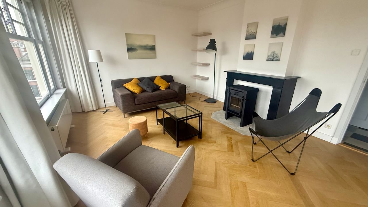 Licht hoekappartement met open haard - Afbeelding 3