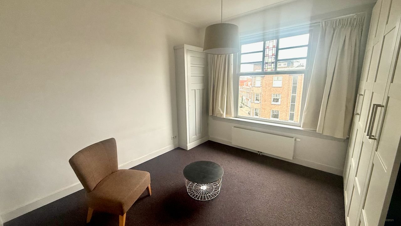 Licht hoekappartement met open haard - Afbeelding 15