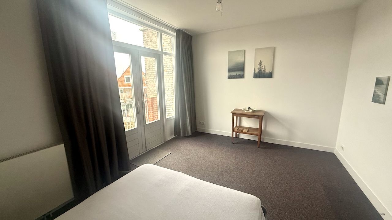 Licht hoekappartement met open haard - Afbeelding 13