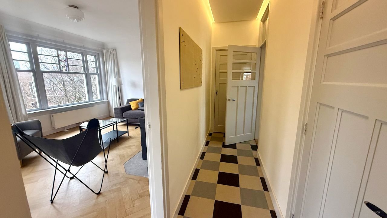 Licht hoekappartement met open haard - Afbeelding 18