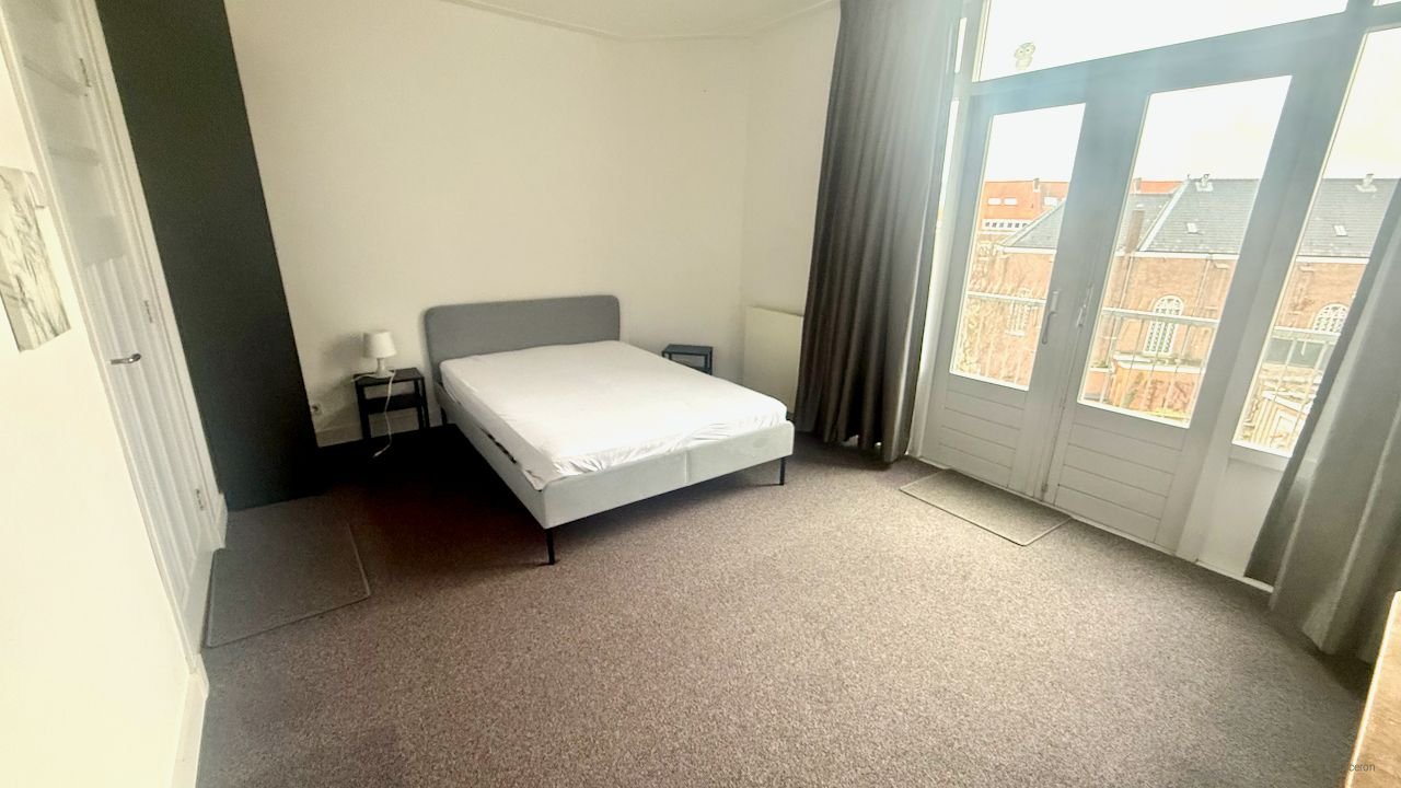 Licht hoekappartement met open haard - Afbeelding 12