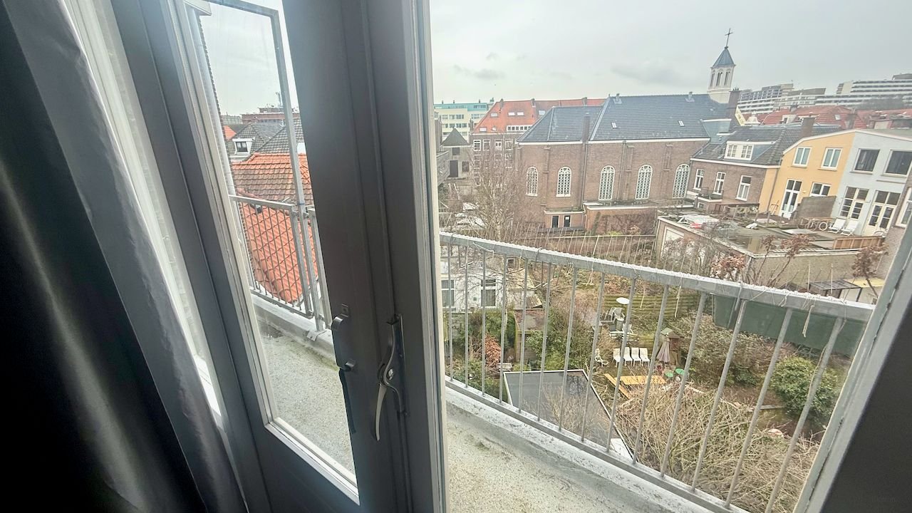 Licht hoekappartement met open haard - Afbeelding 14