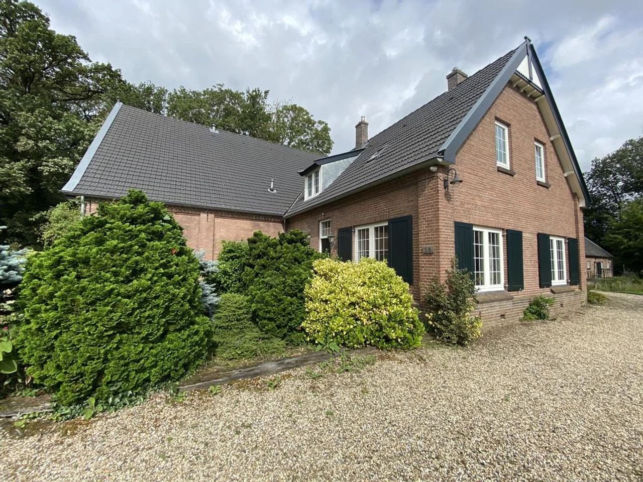 Vrijstaande woonboerderij aan de Waaldijk - Afbeelding 2