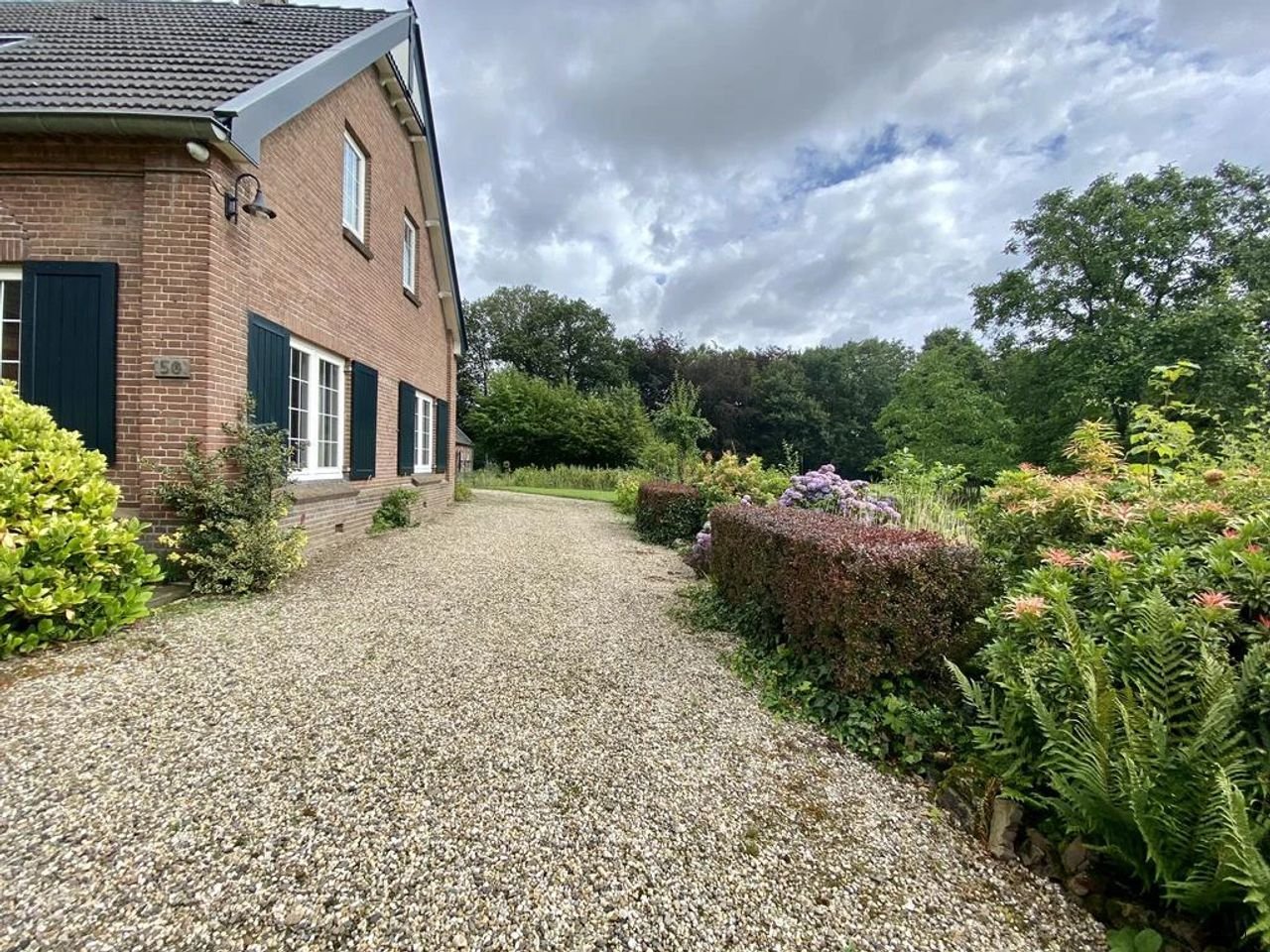 Vrijstaande woonboerderij aan de Waaldijk - Afbeelding 20