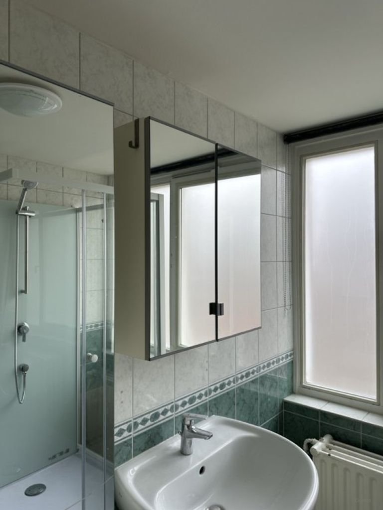 Tussenwoning met tuin in hartje Hoensbroek - Afbeelding 2