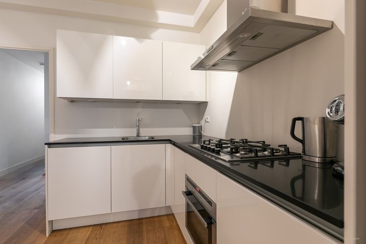 Gerenoveerde benedenwoning met zonnige tuin - Afbeelding 8