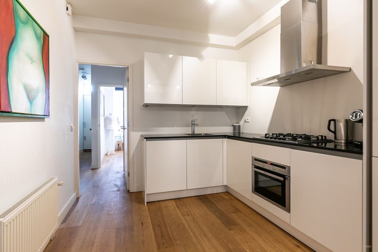 Gerenoveerde benedenwoning met zonnige tuin - Afbeelding 6