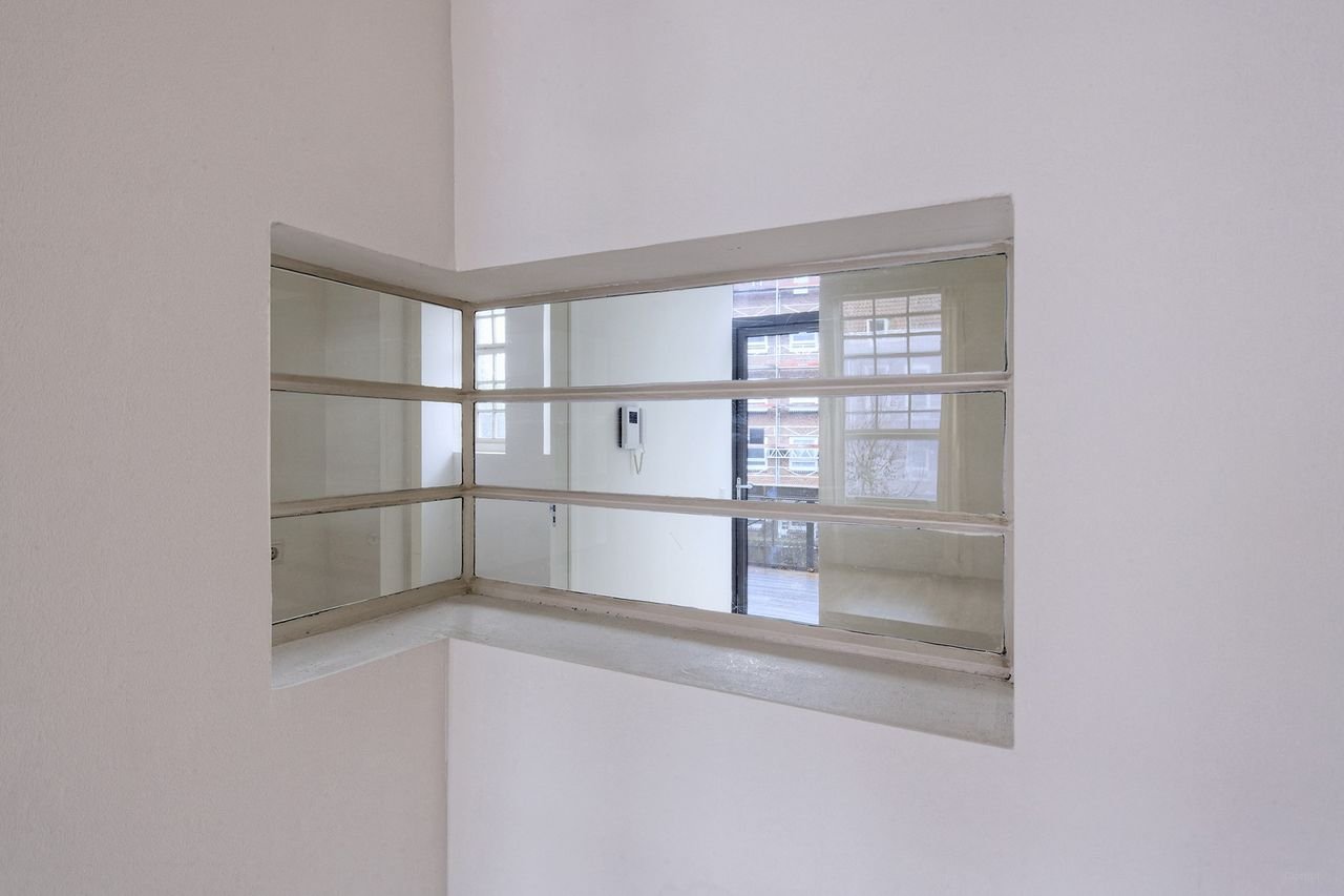 Licht appartement met enorme binnentuin - Afbeelding 11