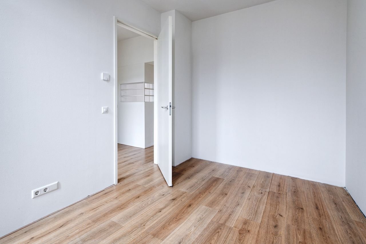 Licht appartement met enorme binnentuin - Afbeelding 9