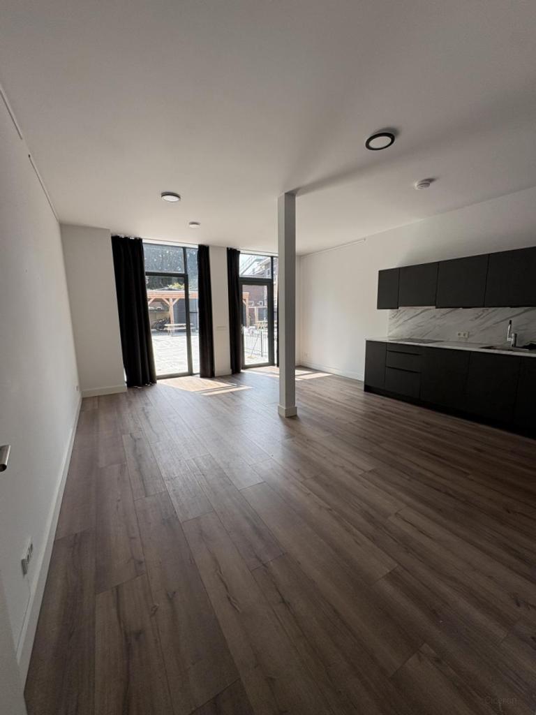 Nieuwbouwappartement met tuin in Tilburg - Afbeelding 1