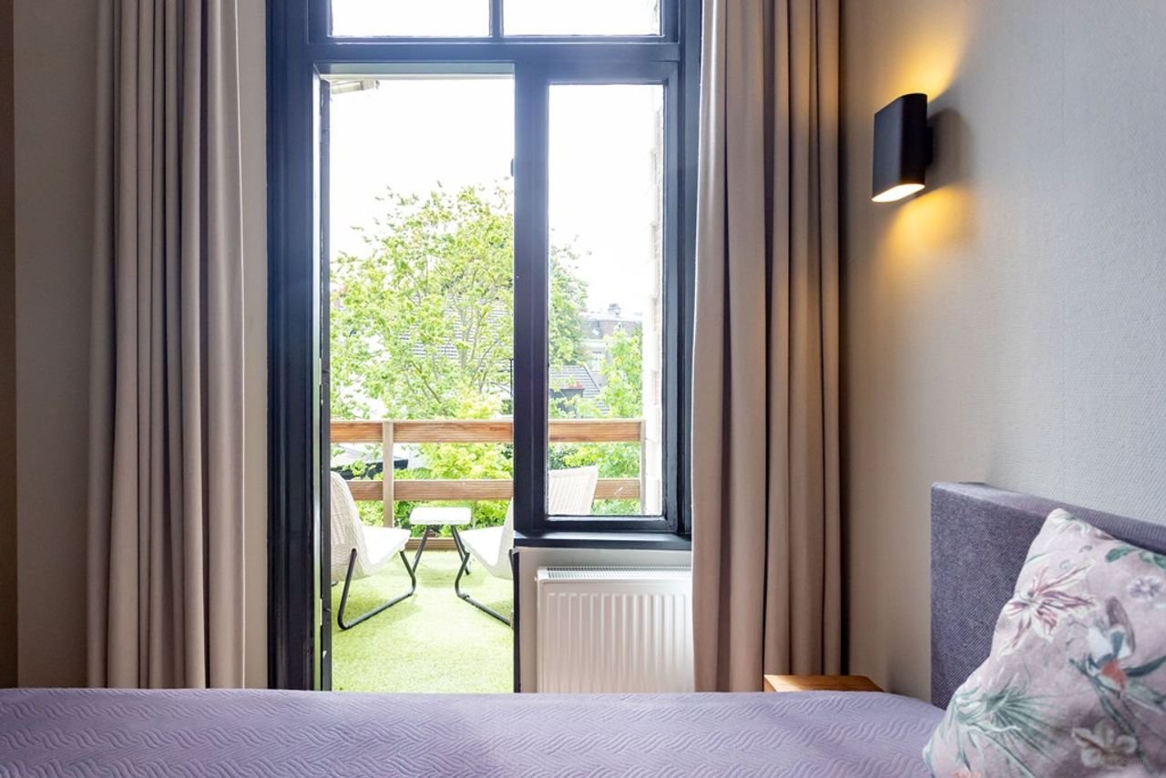 Licht appartement in monumentaal Florapark - Afbeelding 11