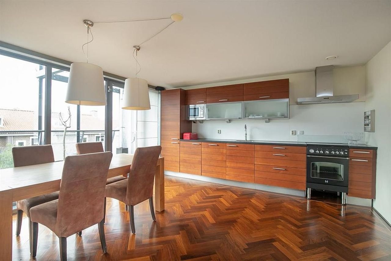 Riant appartement (135m²) met dakterras en parking - Afbeelding 17