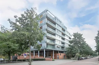 Riant appartement (135m²) met dakterras en parking