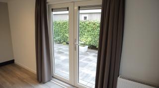 Modern chalet met tuin vlak bij centrum - Afbeelding 4