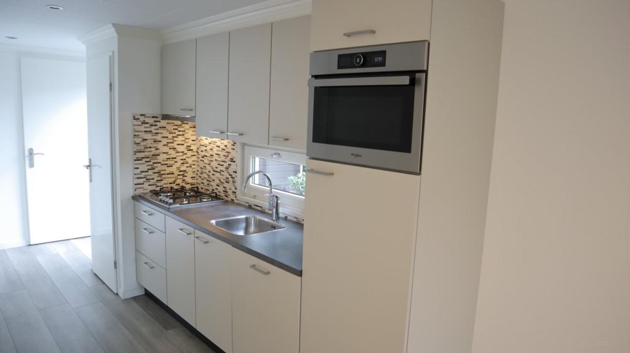 Modern chalet met tuin vlak bij centrum - Afbeelding 11