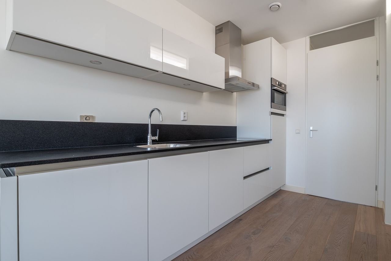 Modern appartement op de topetage met parkeerplek - Afbeelding 6