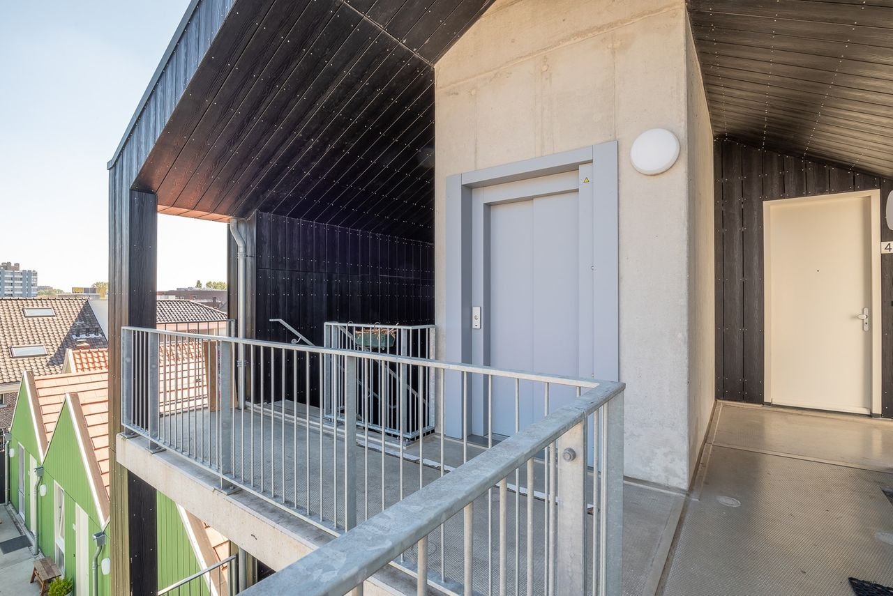 Modern appartement op de topetage met parkeerplek - Afbeelding 15