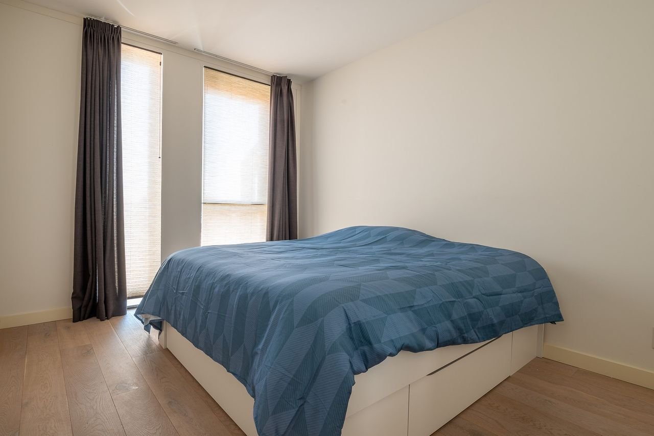 Modern appartement op de topetage met parkeerplek - Afbeelding 10