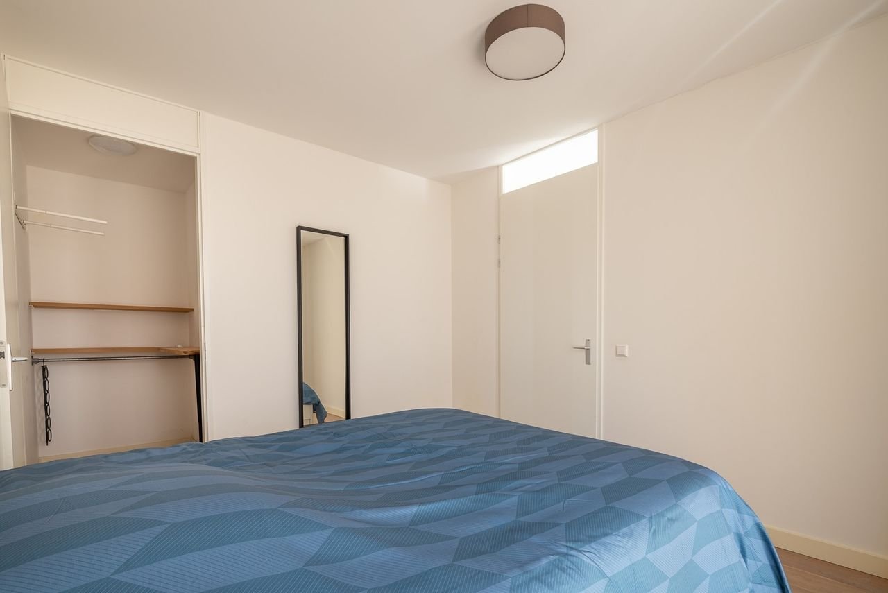 Modern appartement op de topetage met parkeerplek - Afbeelding 11