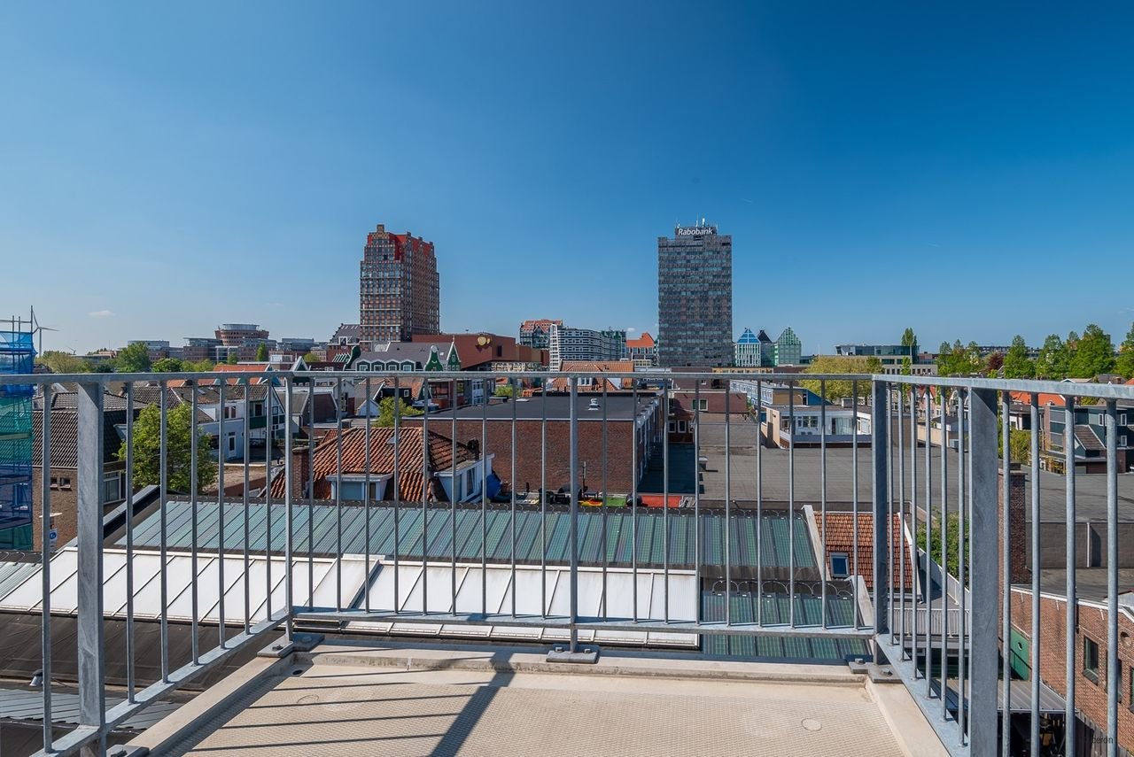 Modern appartement op de topetage met parkeerplek - Afbeelding 9