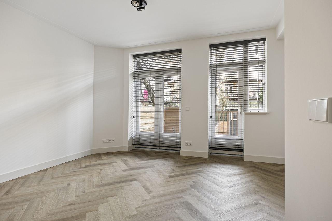 Benedenwoning met 50m² tuin - Afbeelding 2