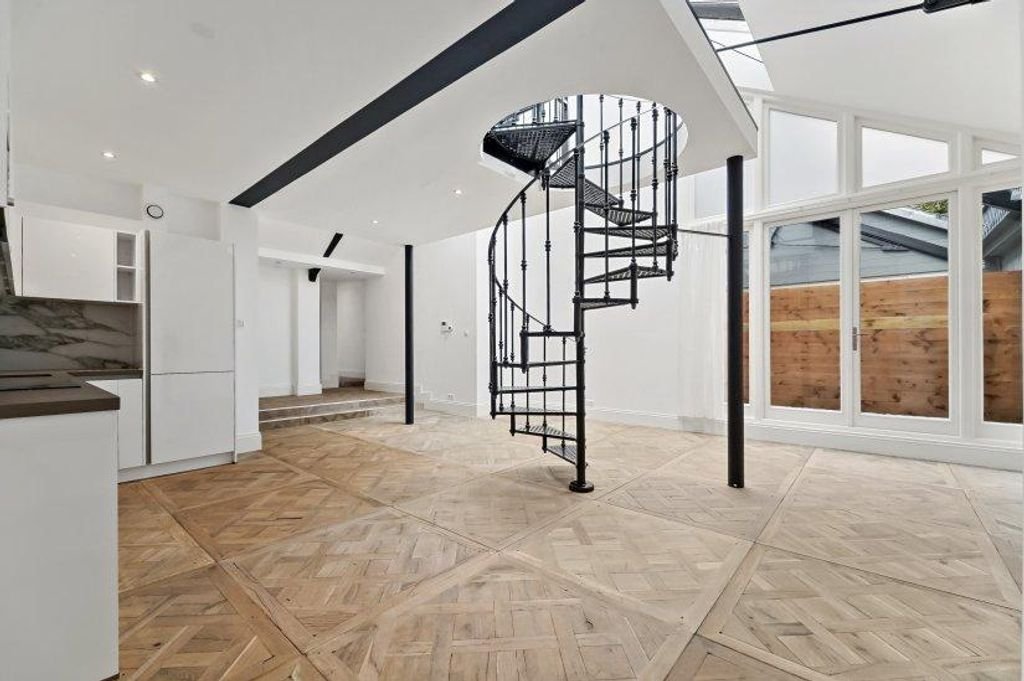 Licht benedenhuis met binnentuin in centrum Den Haag - Afbeelding 1