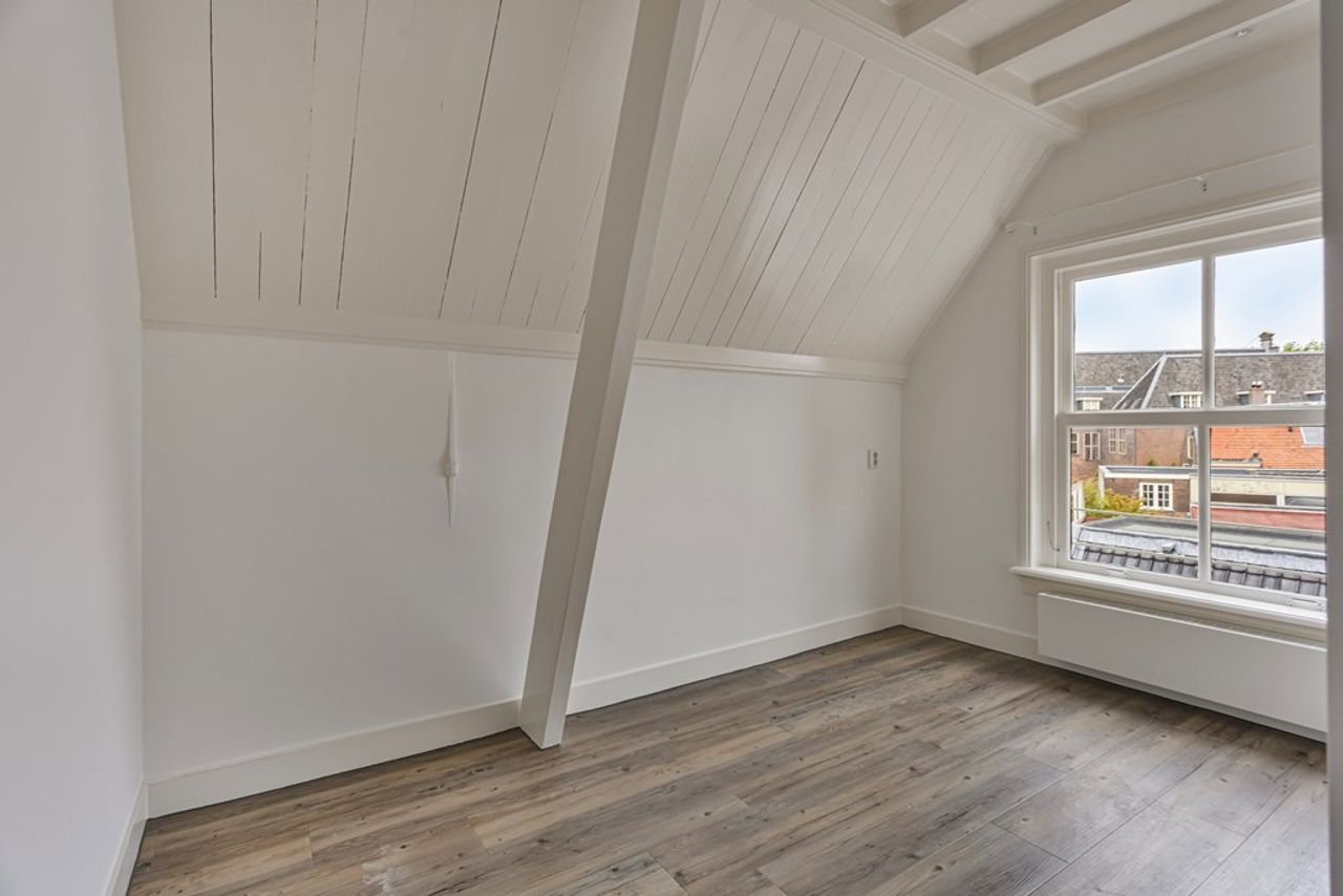 Rijksmonument met parkeerplek in centrum - Afbeelding 24