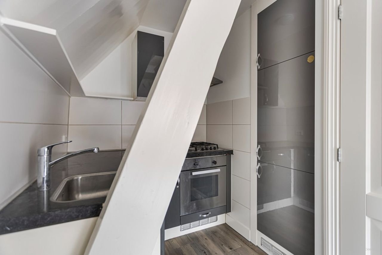 Rijksmonument met parkeerplek in centrum - Afbeelding 12