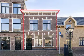House with stained glass and parking