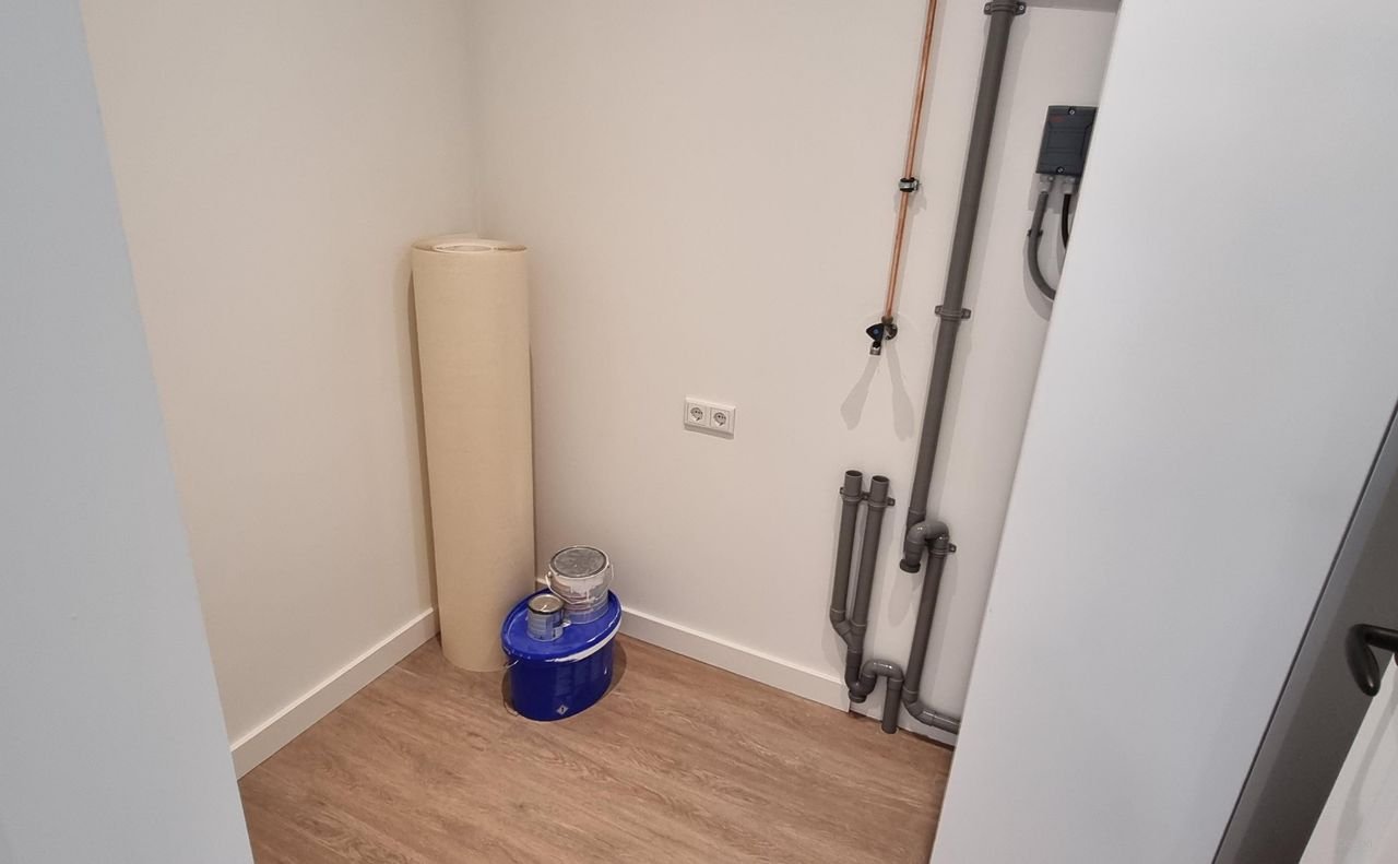 Renovated townhouse with garden in the city center - Image 31