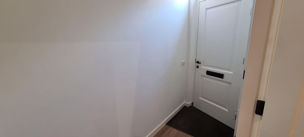 Renovated townhouse with garden in the city center - Image 3