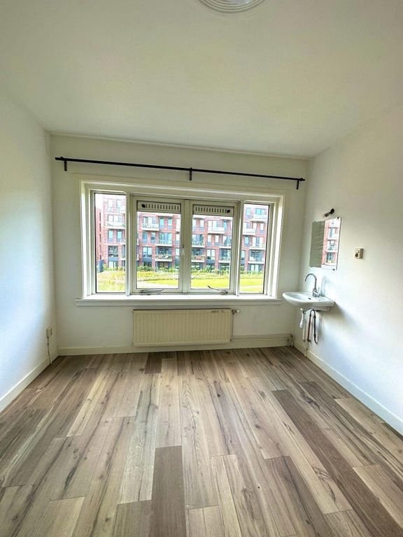 Lichte bovenwoning met dakterras in Dichterswijk - Afbeelding 17