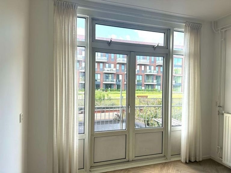 Lichte bovenwoning met dakterras in Dichterswijk - Afbeelding 9