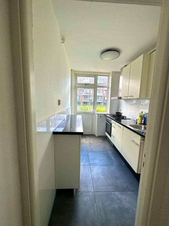 Lichte bovenwoning met dakterras in Dichterswijk - Afbeelding 12