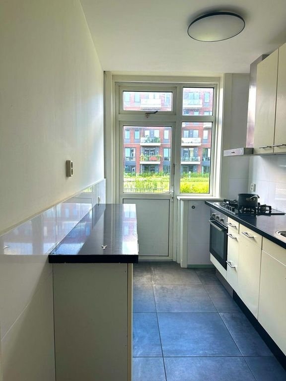 Lichte bovenwoning met dakterras in Dichterswijk - Afbeelding 13