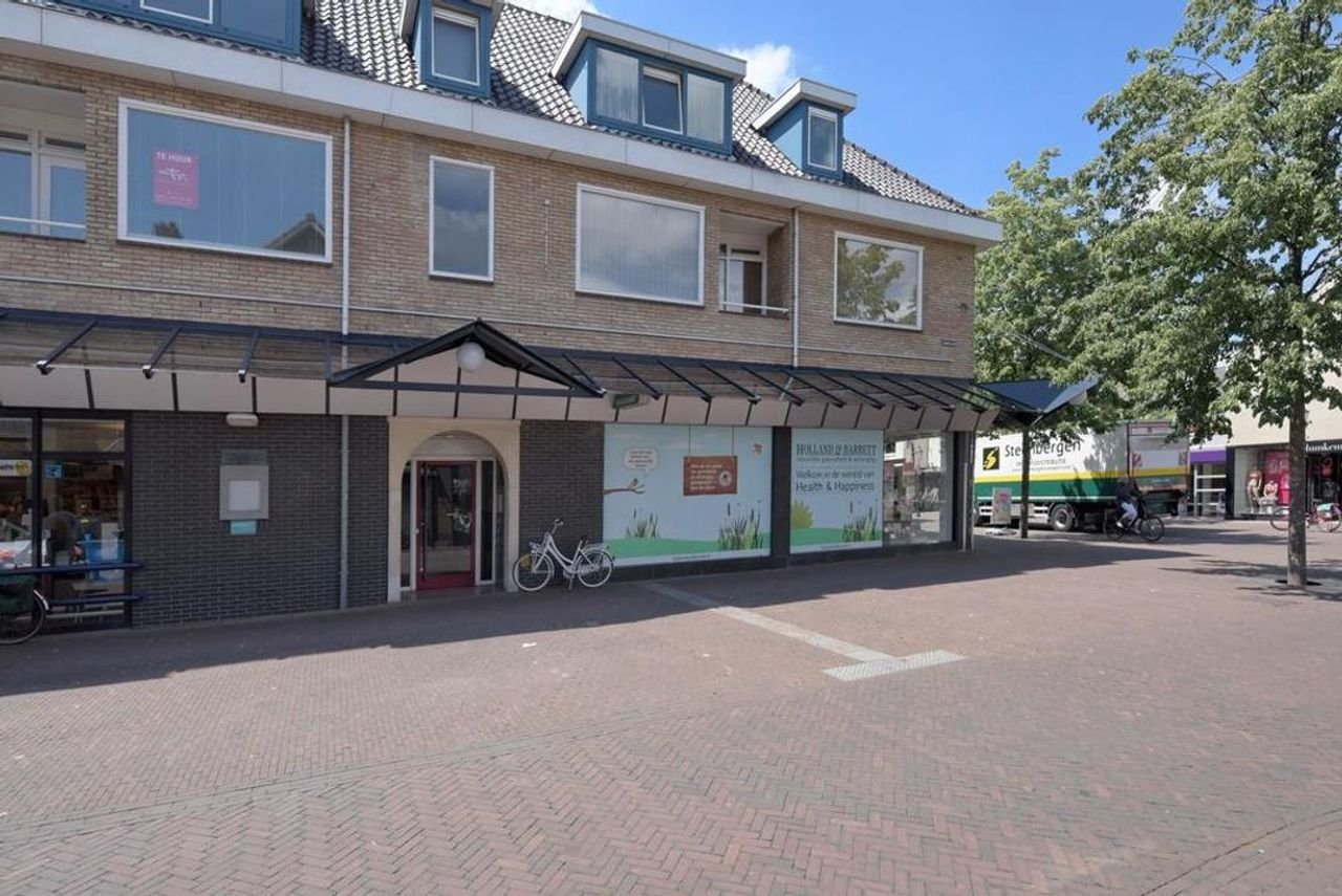 Ruim bovenhuis met terras in centrum - Afbeelding 1