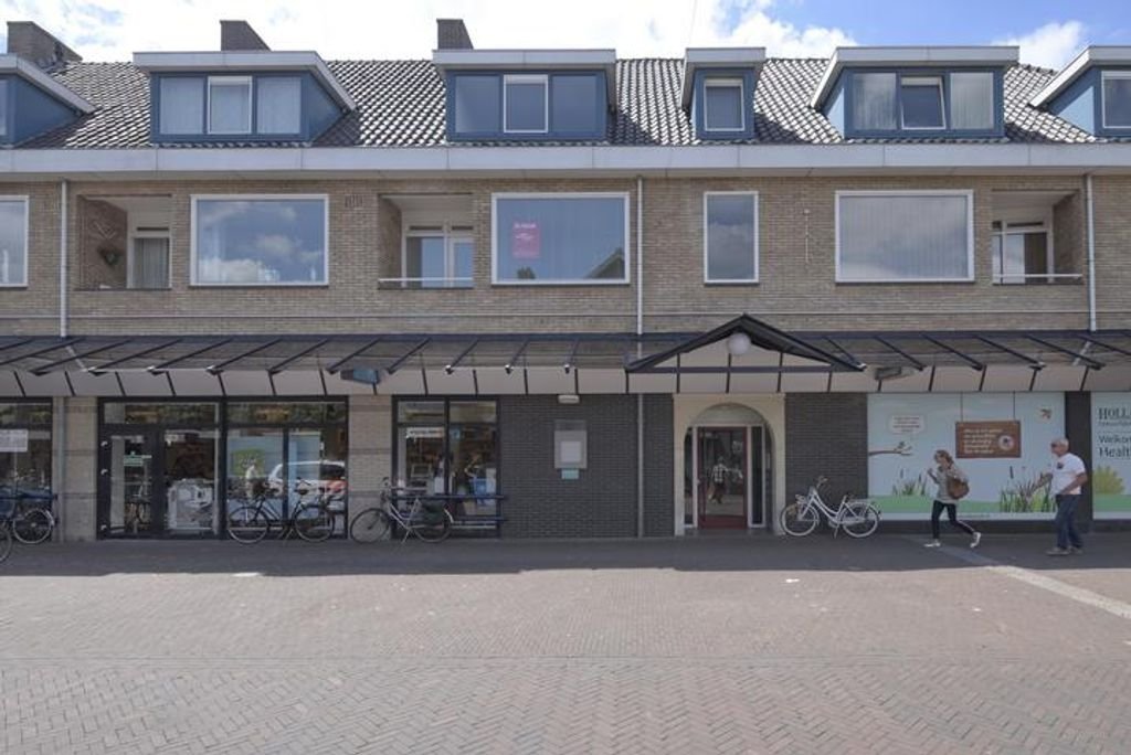 Ruim bovenhuis met terras in centrum - Afbeelding 2