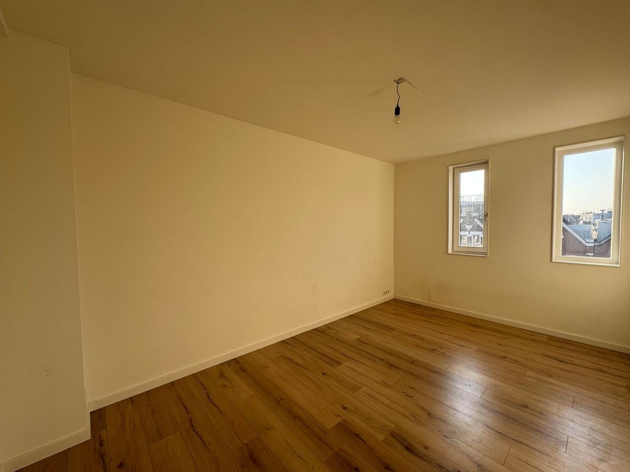 Lichte 3-kamerwoning met dakterras in Middelland - Afbeelding 4