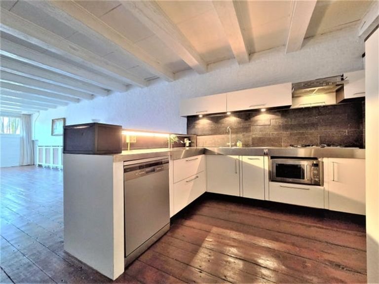 Spacious 120 m² loft with canal view - Image 2
