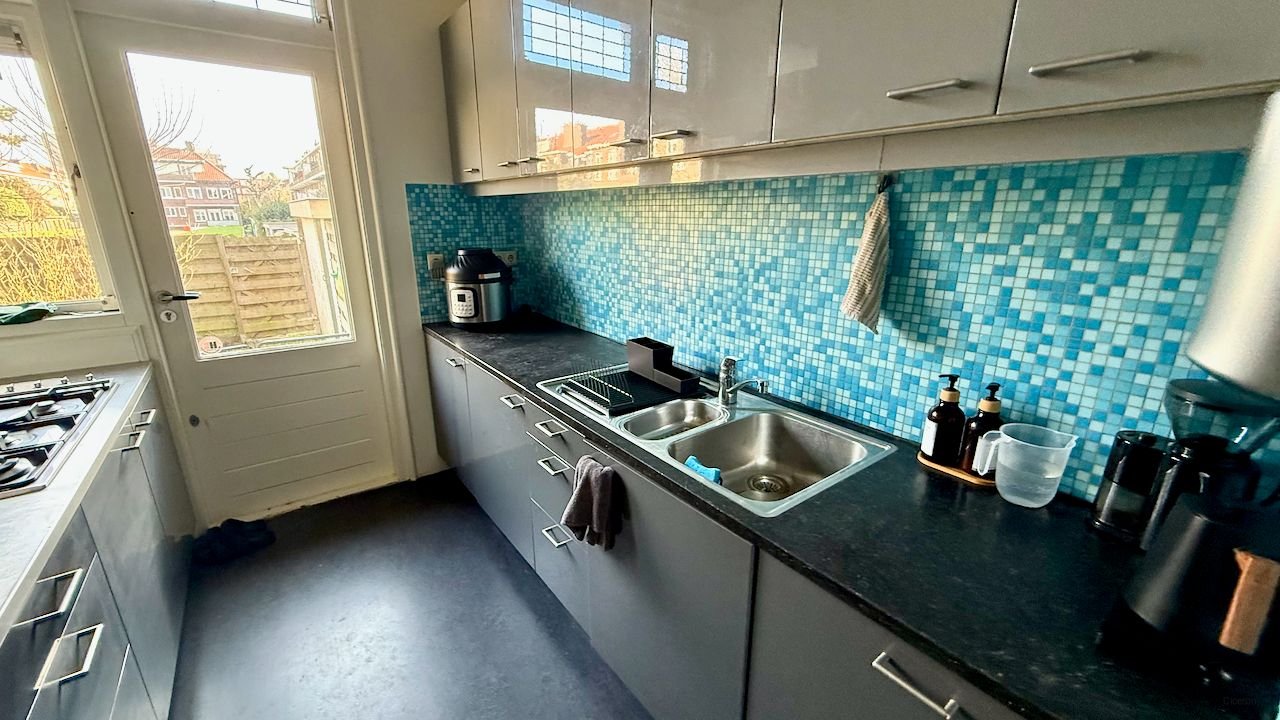 Riante benedenwoning met tuin in Benoordenhout - Afbeelding 5